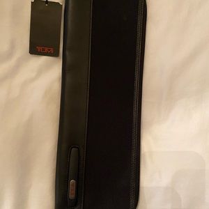 Tumi black tie case